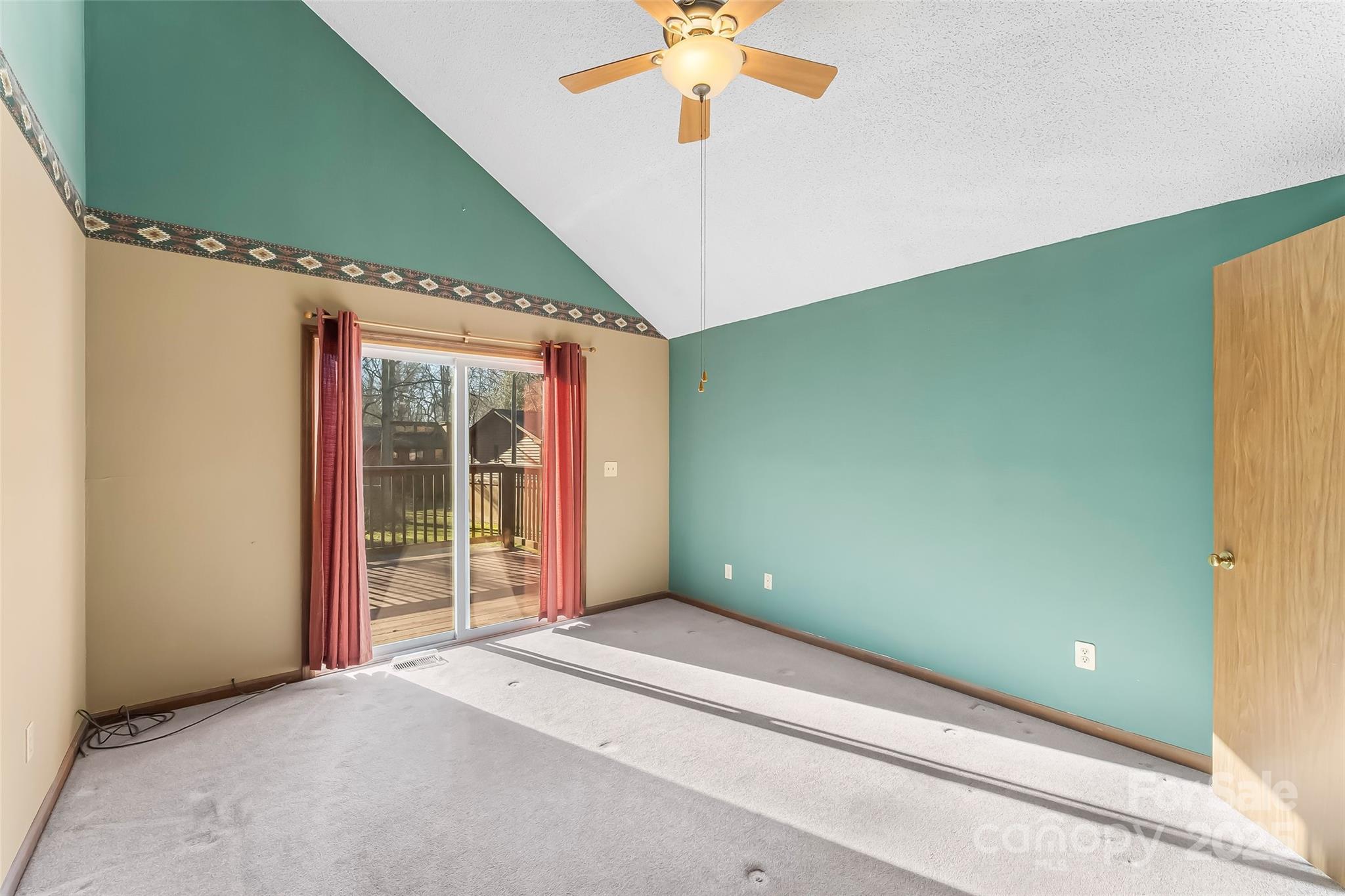 39 Oak Court Fletcher, NC 28732 - Photo 16 of 41 a view of a room with a large window and chandelier