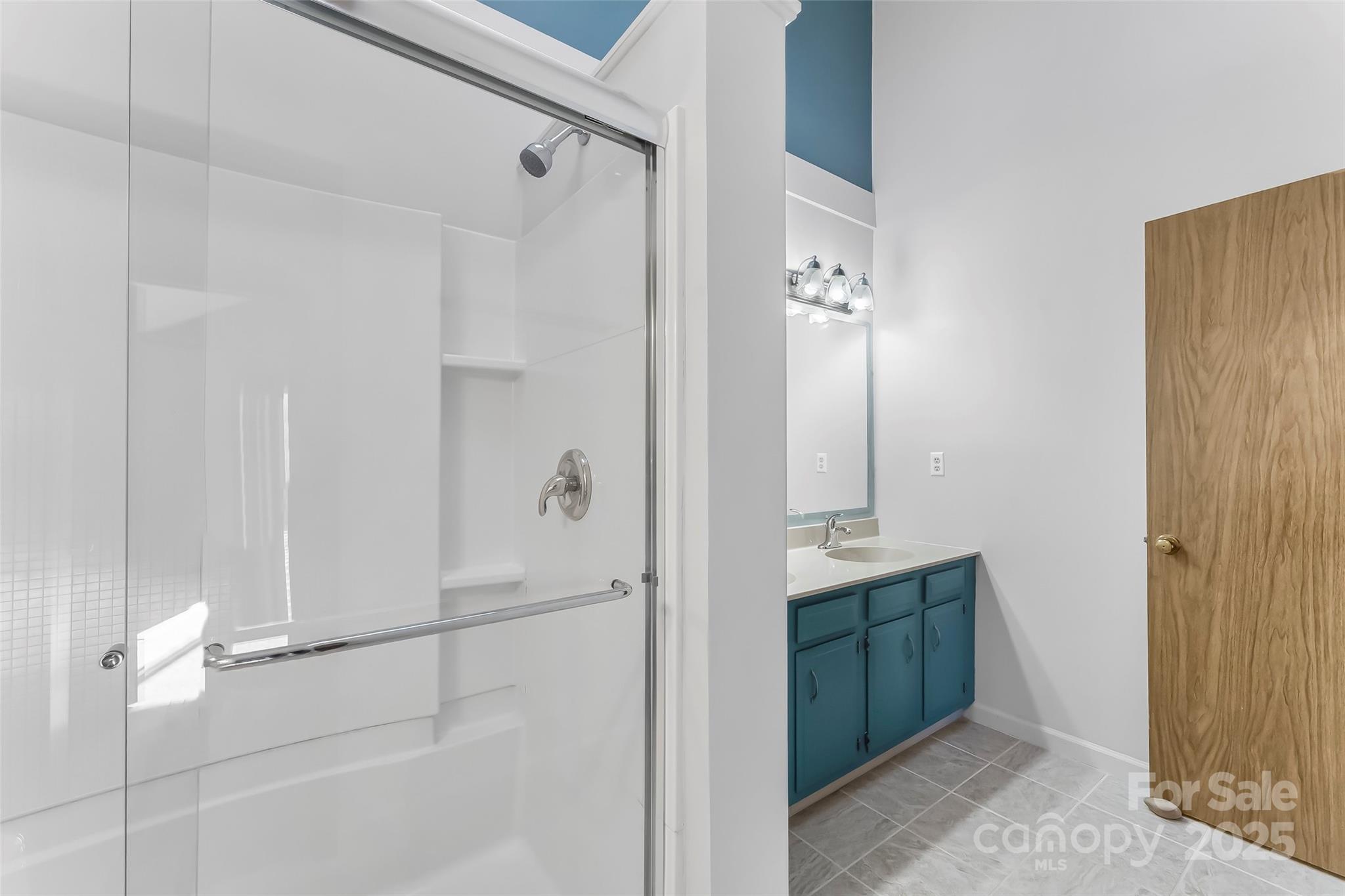 39 Oak Court Fletcher, NC 28732 - Photo 18 of 41 a bathroom with a shower and a sink