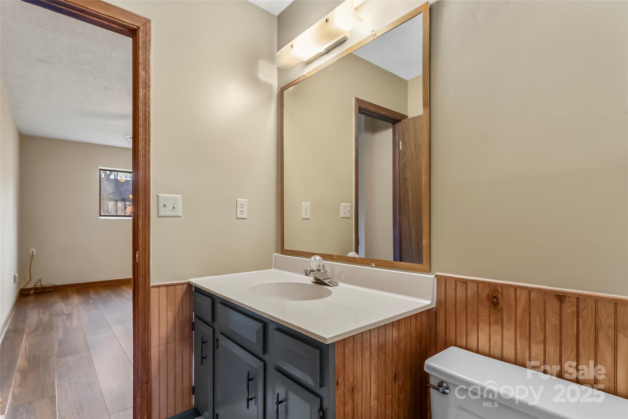 39 Oak Court Fletcher, NC 28732 - Photo 25 of 41 a bathroom with a sink vanity and a mirror