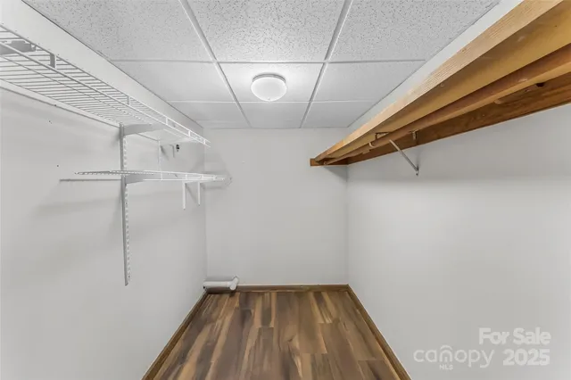 a view of a room with racks on the wall