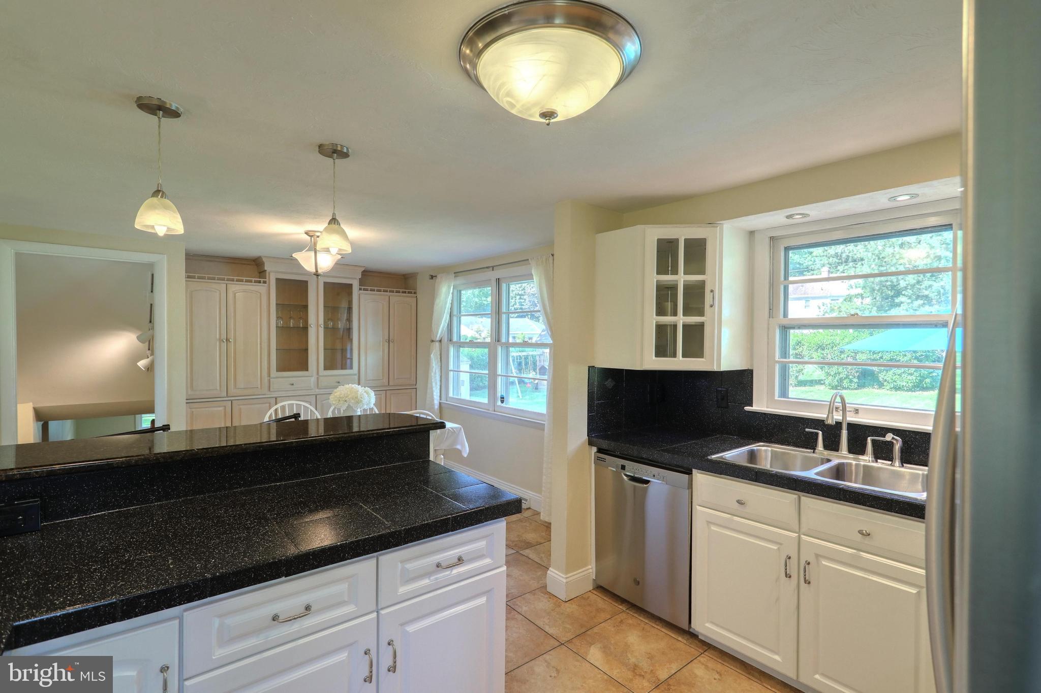 2427 Pine Grove Road York, PA 17403 - Photo 12 of 34 RESURFACED TILE COUNTERTOPS