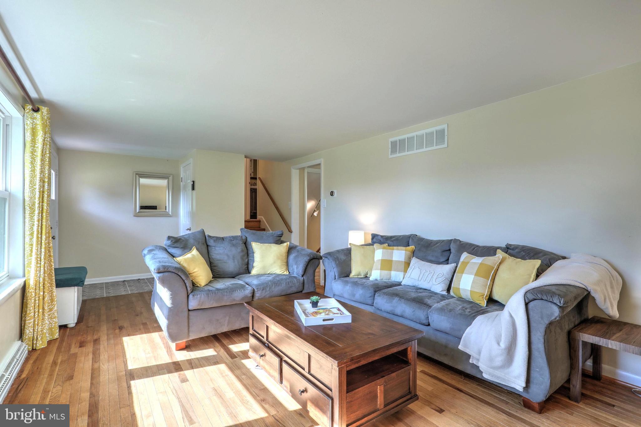 2427 Pine Grove Road York, PA 17403 - Photo 5 of 34 LIVING RM W/ REAL WOOD FLOORS