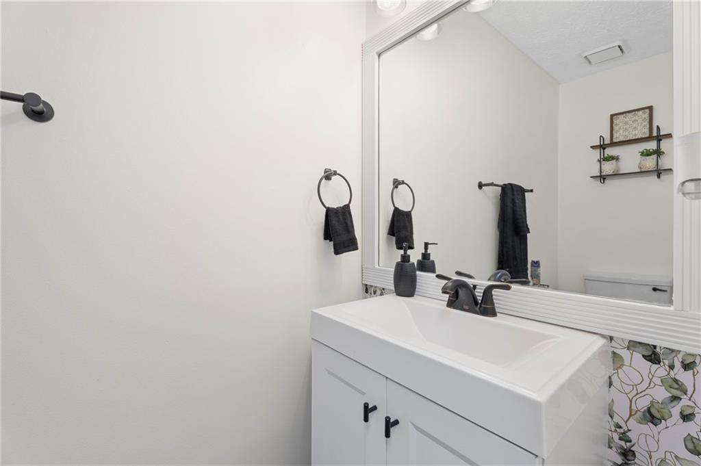 3292 Basking Shade Lane Decatur, GA 30034 - Photo 15 of 57 a bathroom with a sink and a mirror