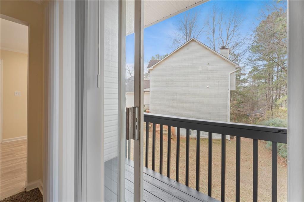 3292 Basking Shade Lane Decatur, GA 30034 - Photo 17 of 57 a view of a wooden house with a small yard