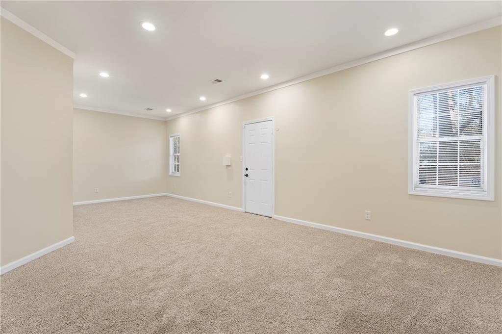 3292 Basking Shade Lane Decatur, GA 30034 - Photo 21 of 57 an empty room with windows