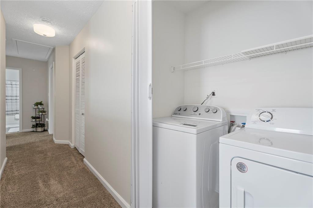 3292 Basking Shade Lane Decatur, GA 30034 - Photo 26 of 57 a view of storage and utility room with washer and dryer