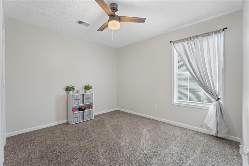 3292 Basking Shade Lane Decatur, GA 30034 - Photo 29 of 57 an empty room with a workbench