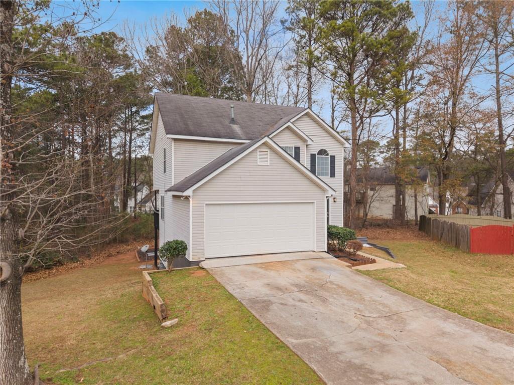 3292 Basking Shade Lane Decatur, GA 30034 - Photo 4 of 57 a view of a house with a yard and tree s
