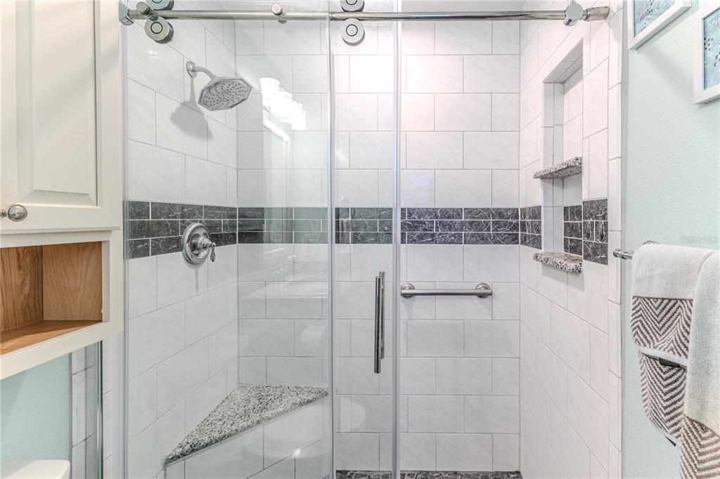 6375 Ocean Pines Lane Spring Hill, FL 34606 - Photo 23 of 50 a bathroom with a shower