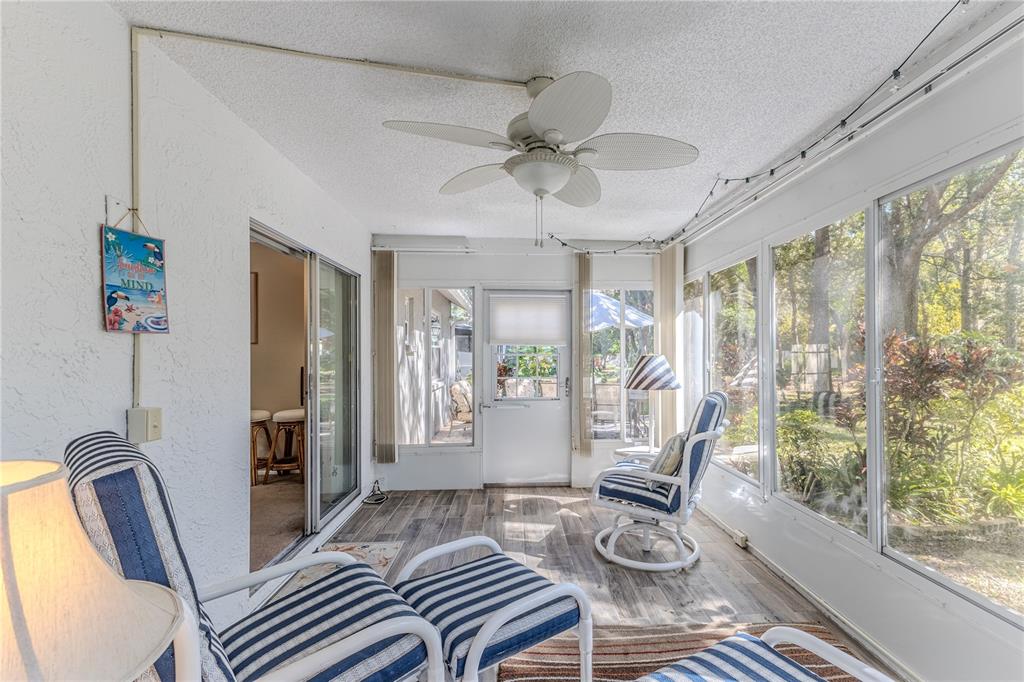 6375 Ocean Pines Lane Spring Hill, FL 34606 - Photo 30 of 50 a living room with furniture and a window