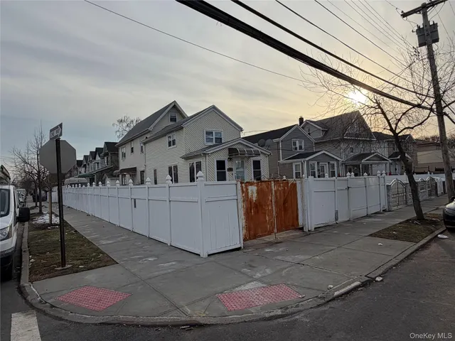 a view of a house with a park