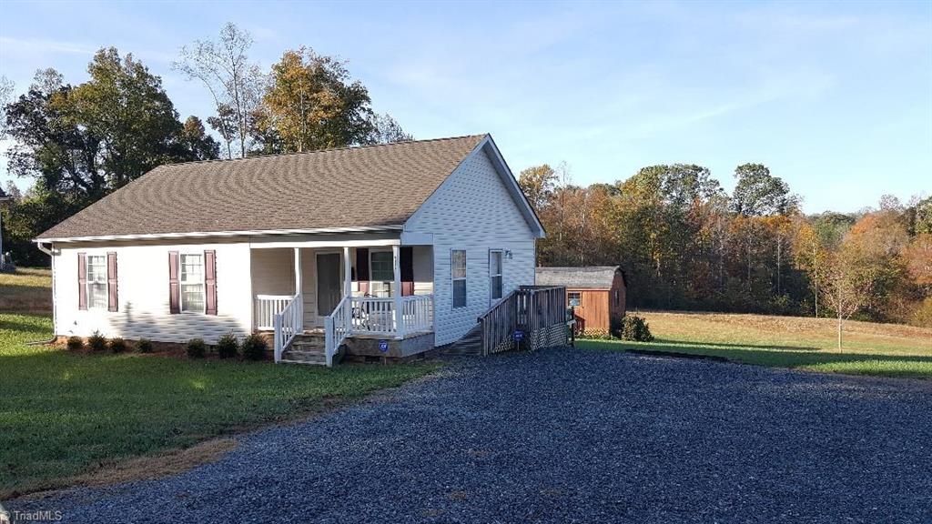 5116 Davis Road Winston-Salem, NC 27105 - Photo 22 of 22 Right side of property with graveled driveway