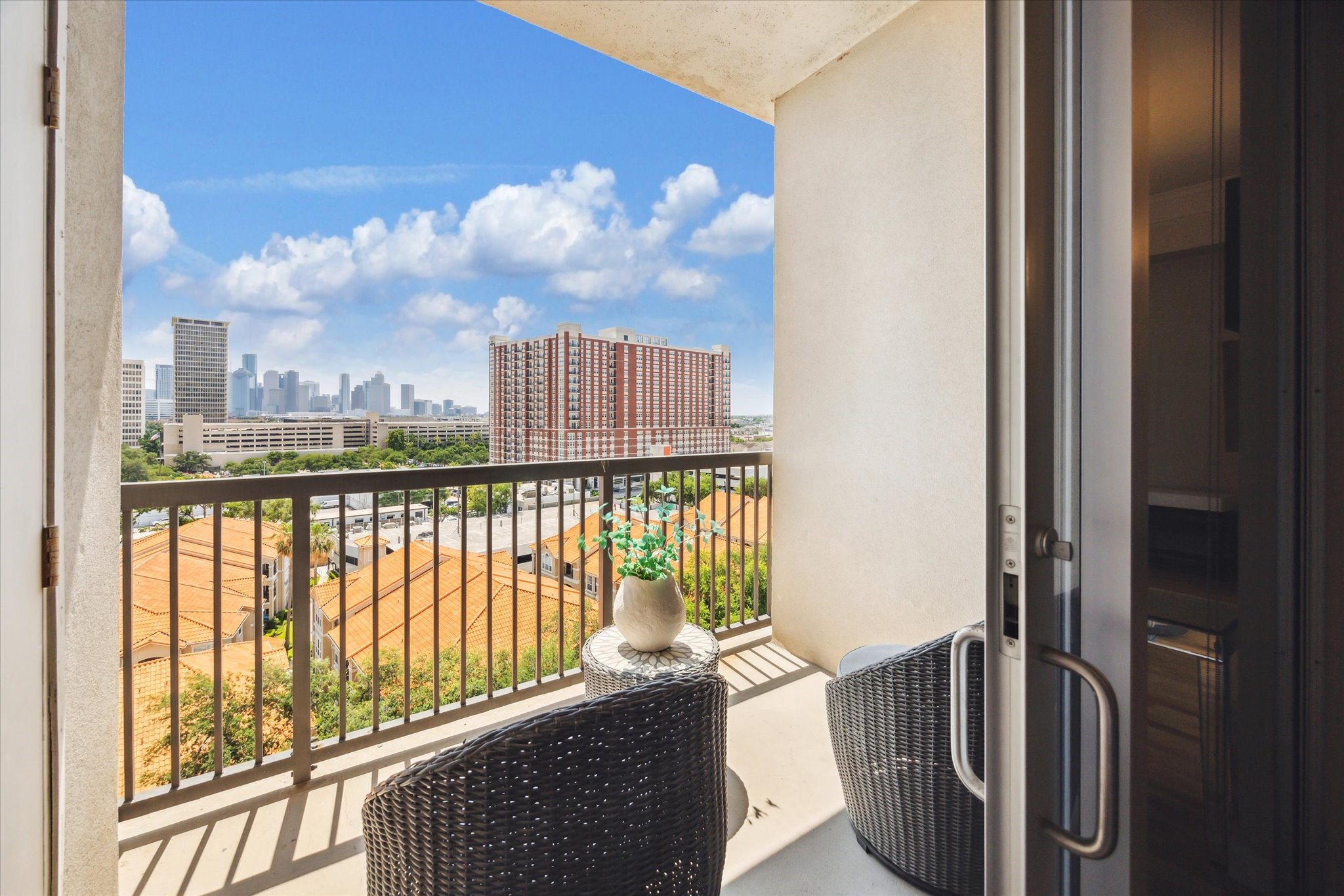 3333 Allen Parkway, Unit 1004 Houston, TX 77019 - Photo 12 of 36 a view of a balcony with furniture