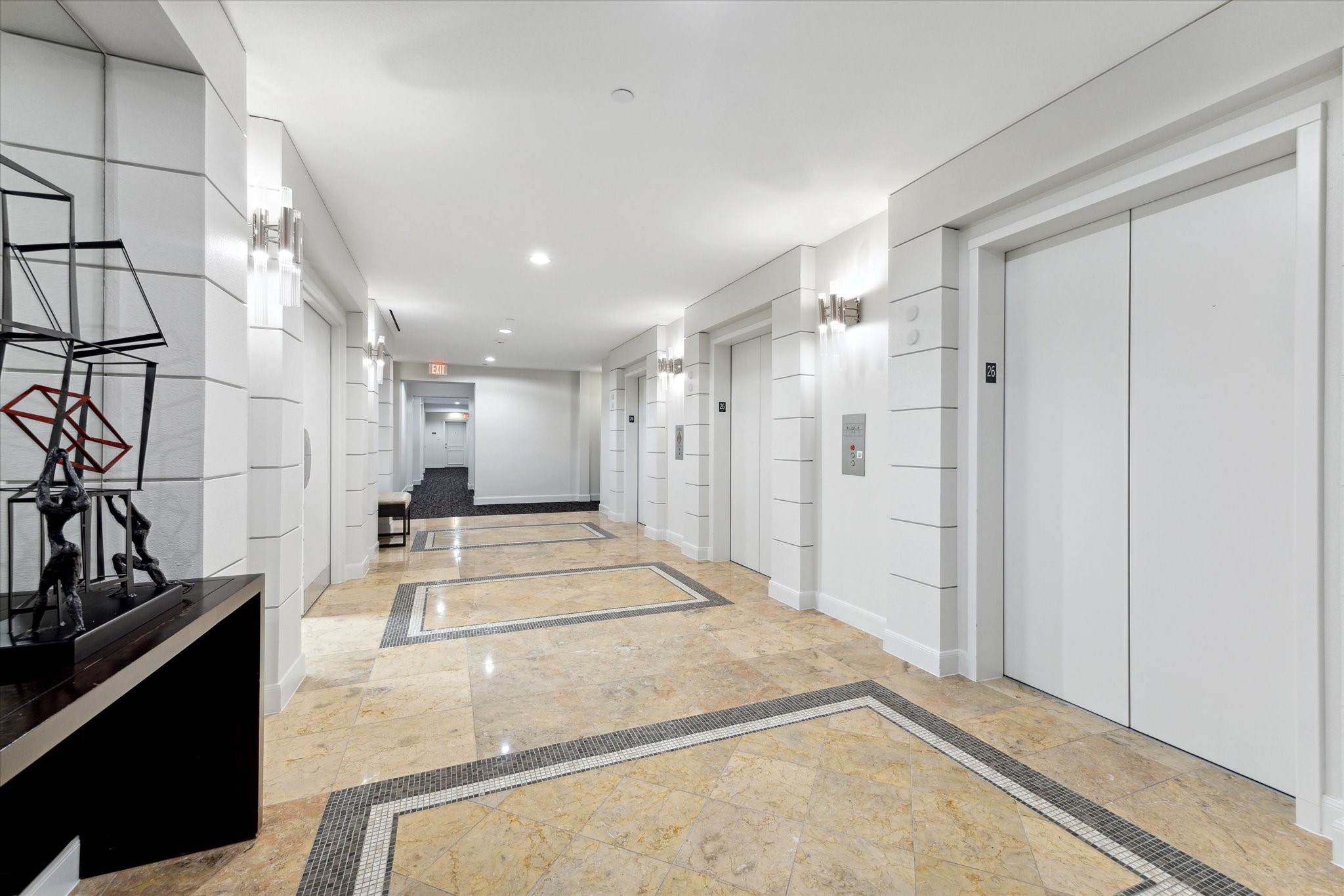 3333 Allen Parkway, Unit 1004 Houston, TX 77019 - Photo 33 of 36 a view of a hallway with wooden floor and staircase
