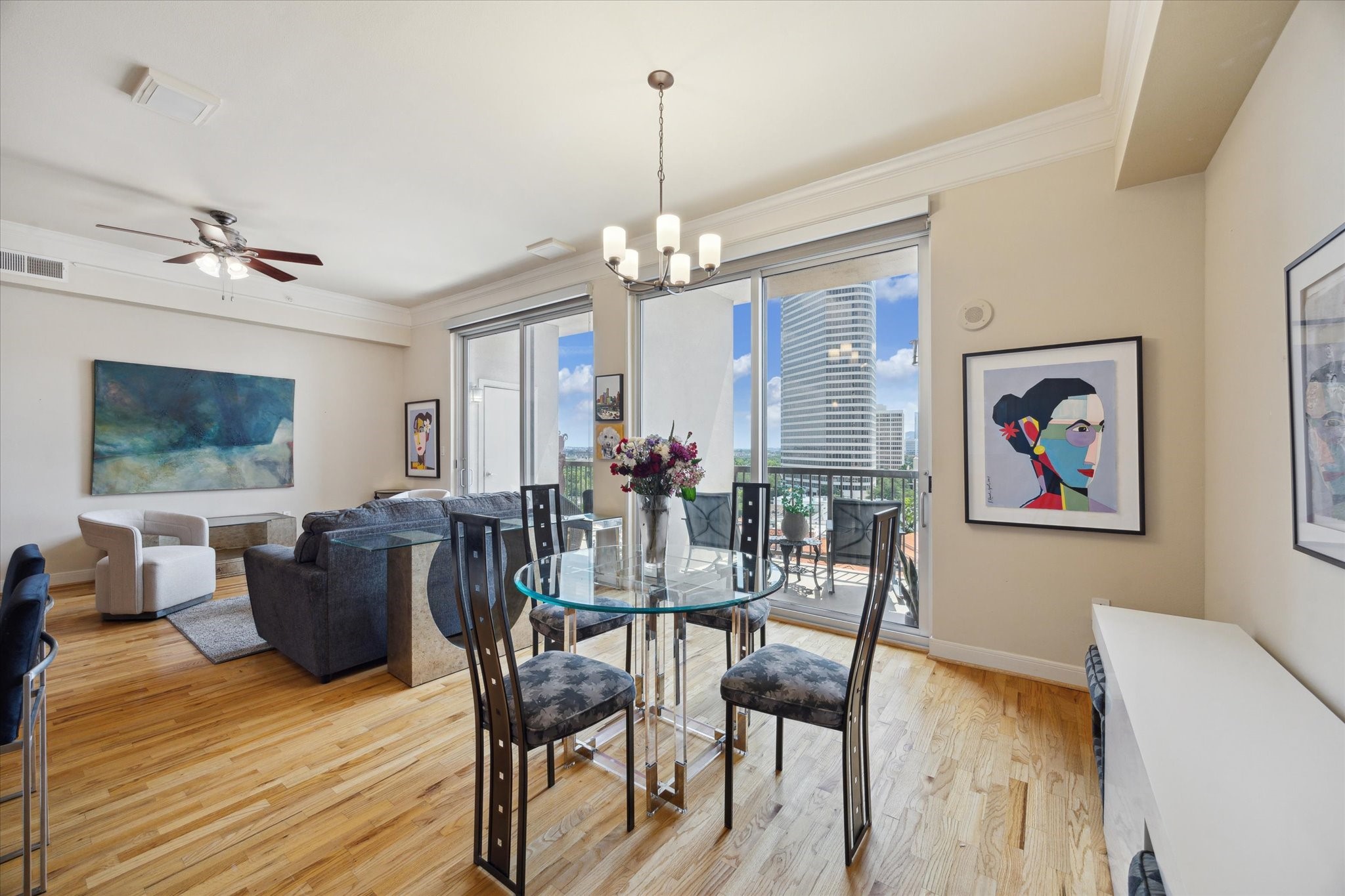 3333 Allen Parkway, Unit 1004 Houston, TX 77019 - Photo 5 of 36 a view of a dining room with furniture window and wooden floor
