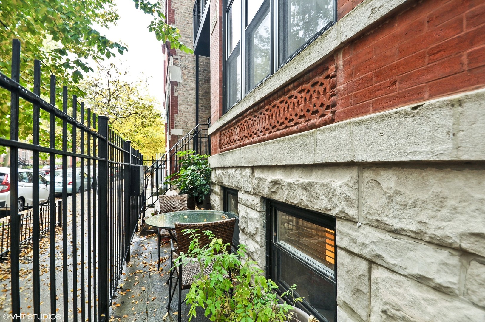 1735 West Erie Street, Unit 1N Chicago, IL 60622 - Photo 16 of 18 a front view of a house with a garden