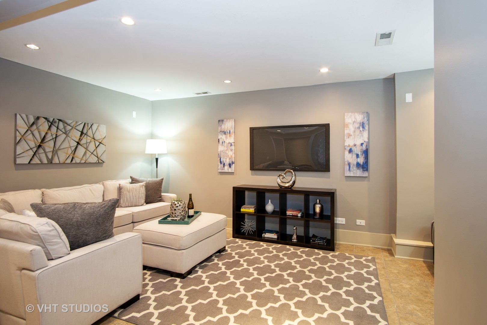 1735 West Erie Street, Unit 1N Chicago, IL 60622 - Photo 8 of 18 a living room with furniture and a flat screen tv