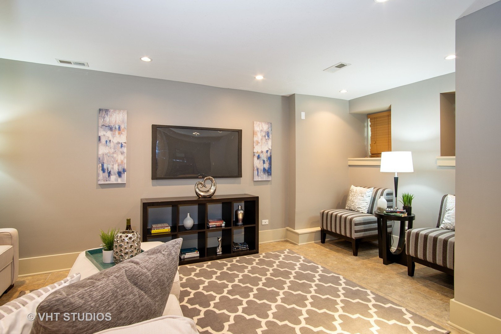 1735 West Erie Street, Unit 1N Chicago, IL 60622 - Photo 9 of 18 a living room with furniture and a flat screen tv