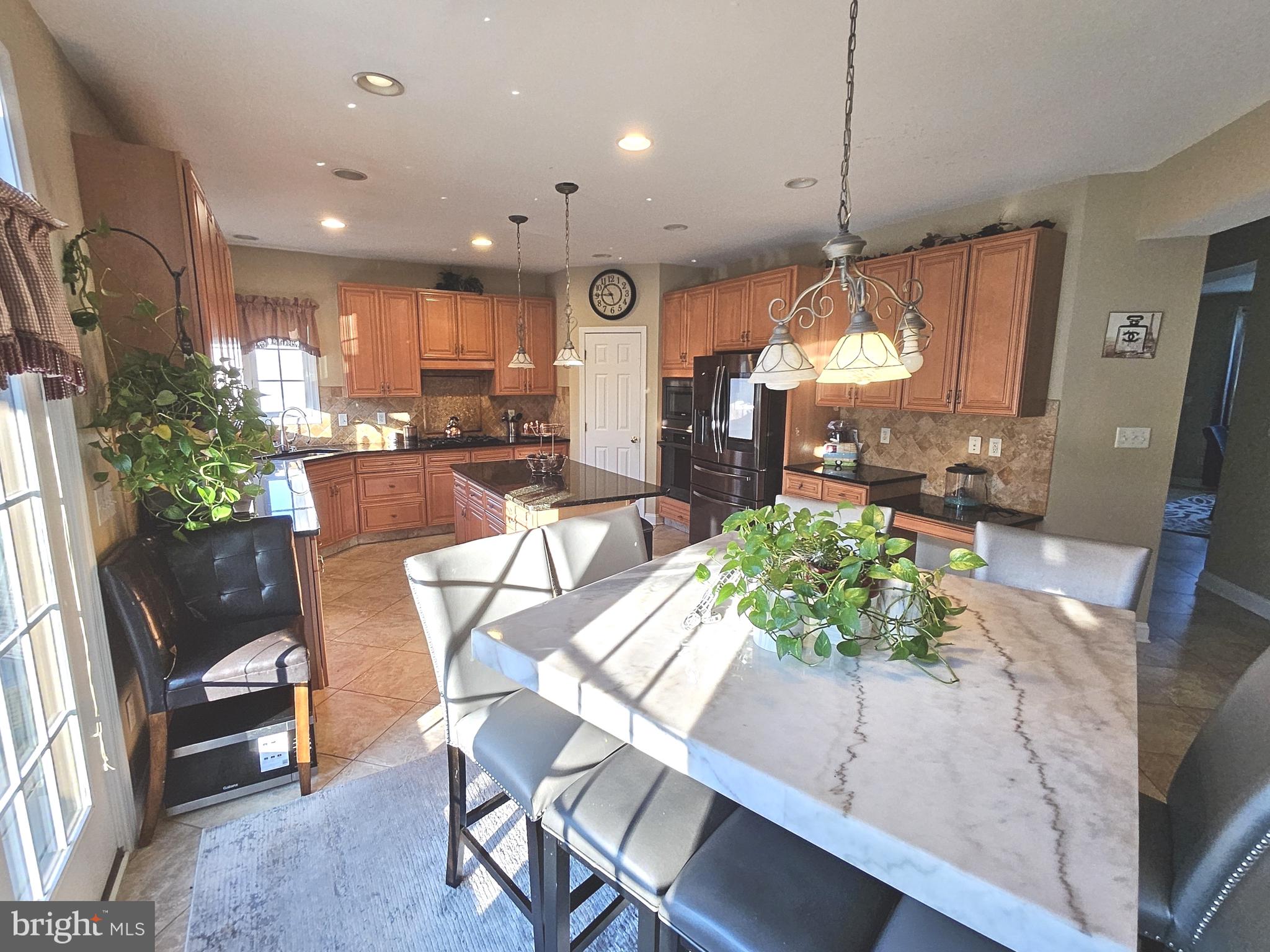 624 Nesting Lane Middletown, DE 19709 - Photo 12 of 50 a view of a dining area with furniture window and wooden floor