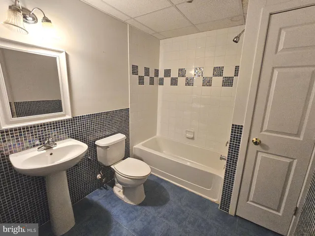 a view of a hallway view with staircase