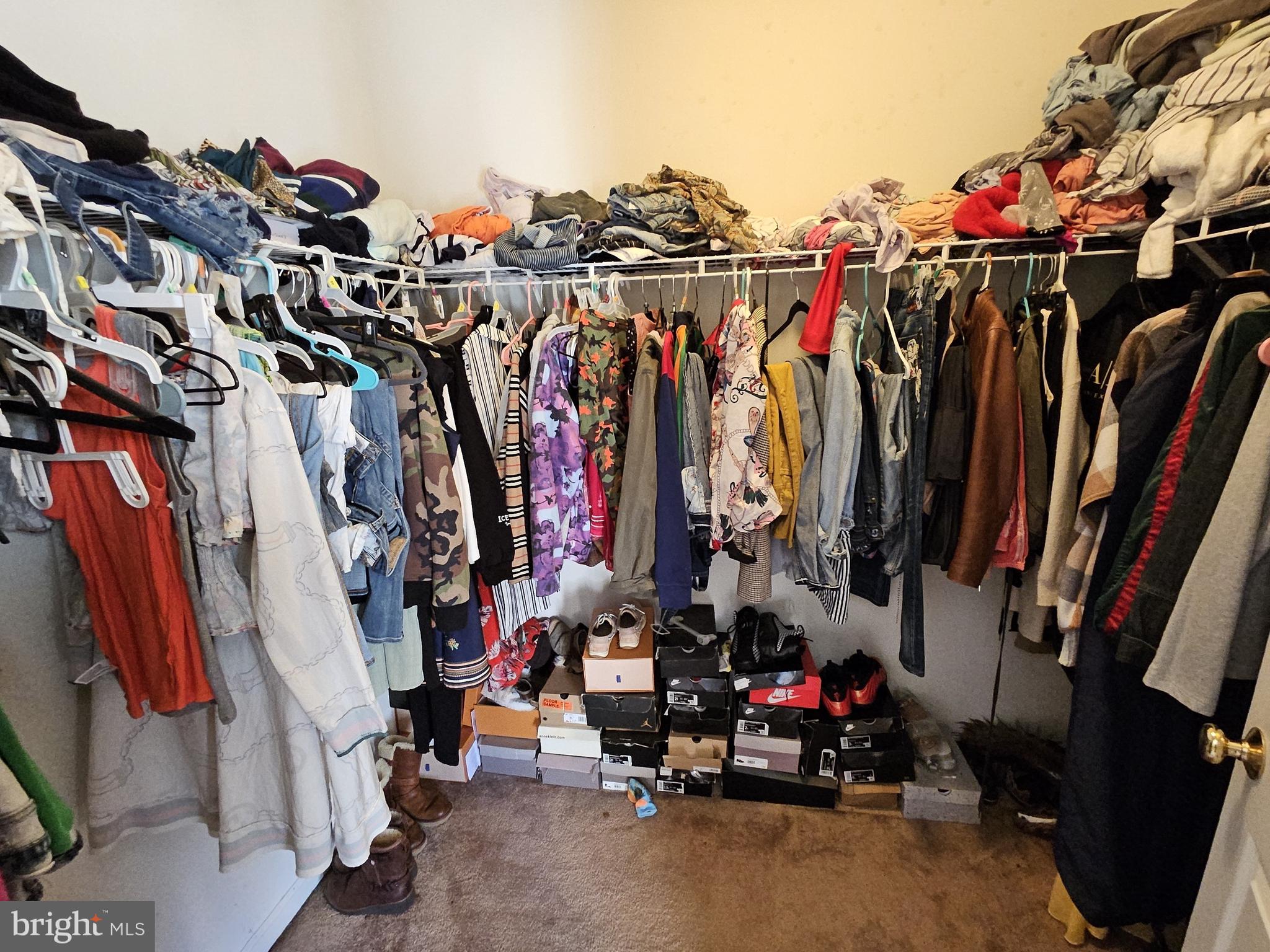 624 Nesting Lane Middletown, DE 19709 - Photo 38 of 50 a view of walk in closet with clothes