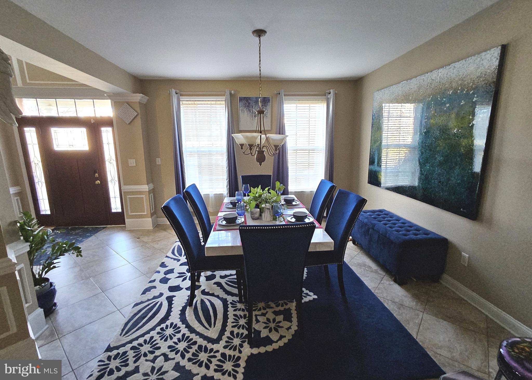 624 Nesting Lane Middletown, DE 19709 - Photo 5 of 50 a view of a dining room with furniture window and outside view