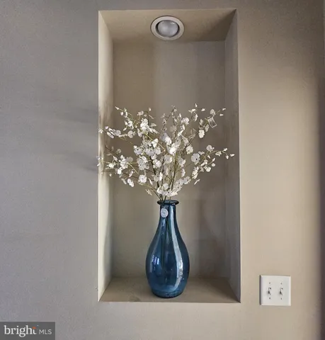 a vase of flowers sitting on a table