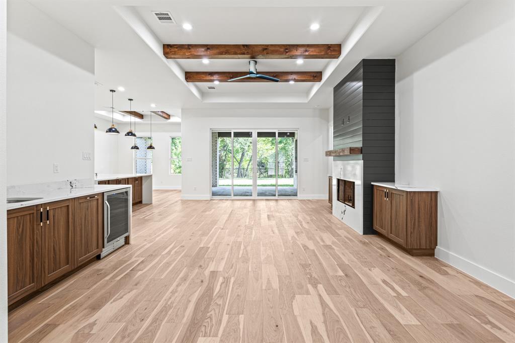 4016 Baker Avenue Dallas, TX 75212 - Photo 14 of 38 wooden floor in an empty room with a window