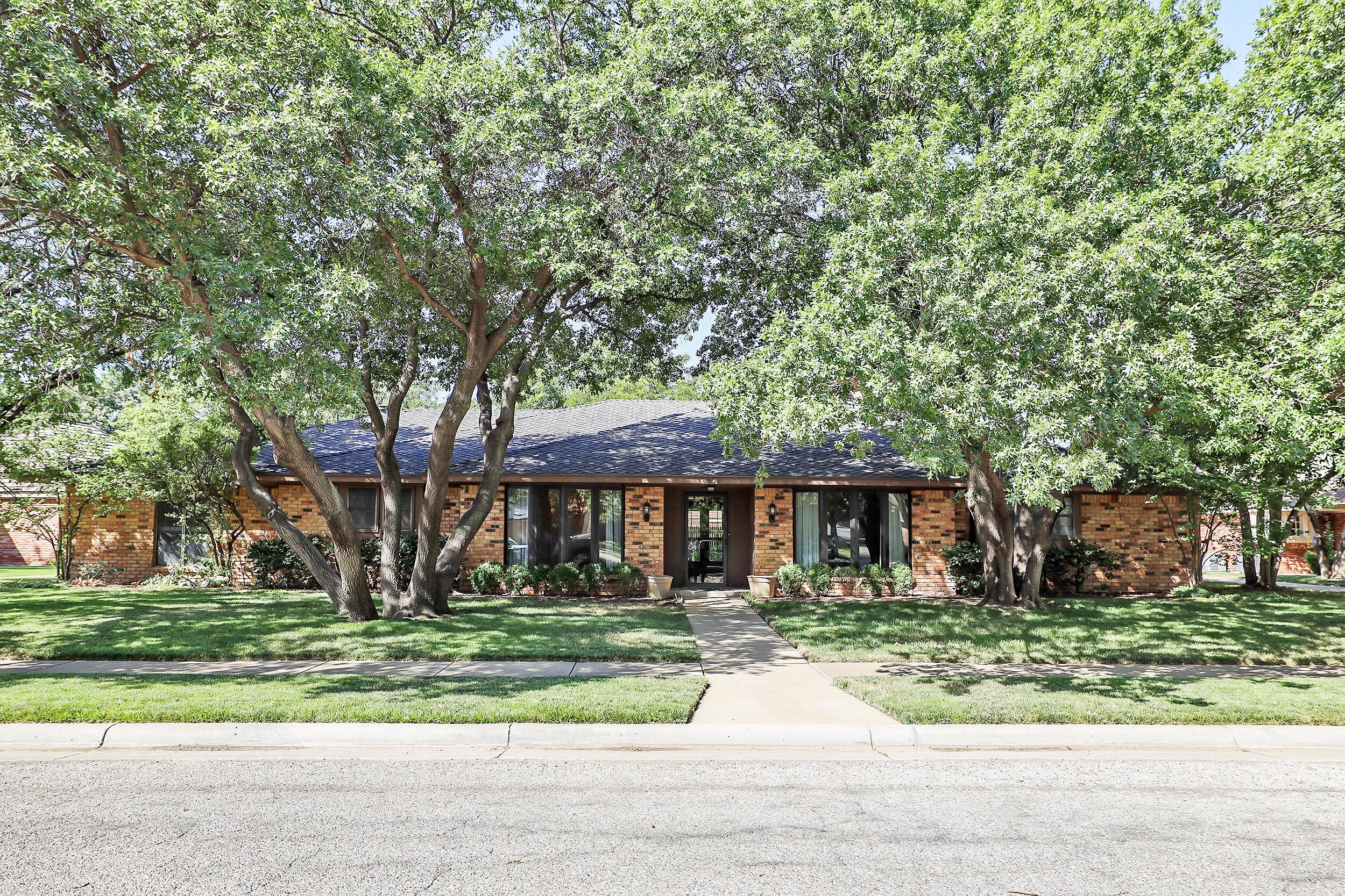 front view of house with a yard