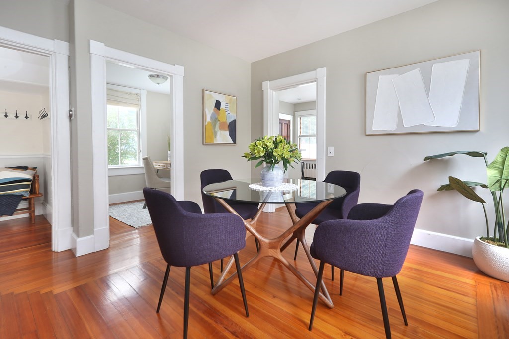 195 Fayette Street Watertown, MA 02472 - Photo 6 of 18 a view of a dining room with furniture and wooden floor