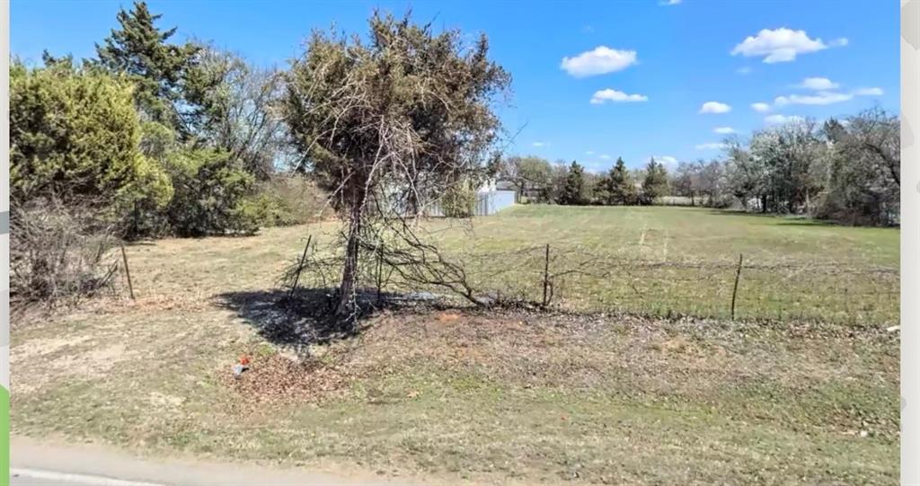 2670 Calender Road Mansfield, TX 76063 - Photo 3 of 5 a view of a yard with a tree