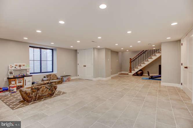201 Brookhaven Road Wallingford, PA 19086 - Photo 22 of 25 Lower Level with attractive tile floor
