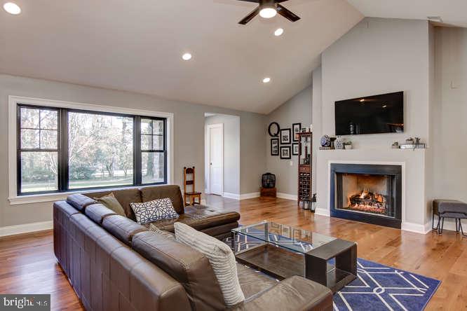 201 Brookhaven Road Wallingford, PA 19086 - Photo 4 of 25 Bright Living Room warmed by a gas fireplace