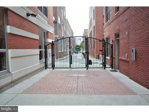 a view of a building with a yard