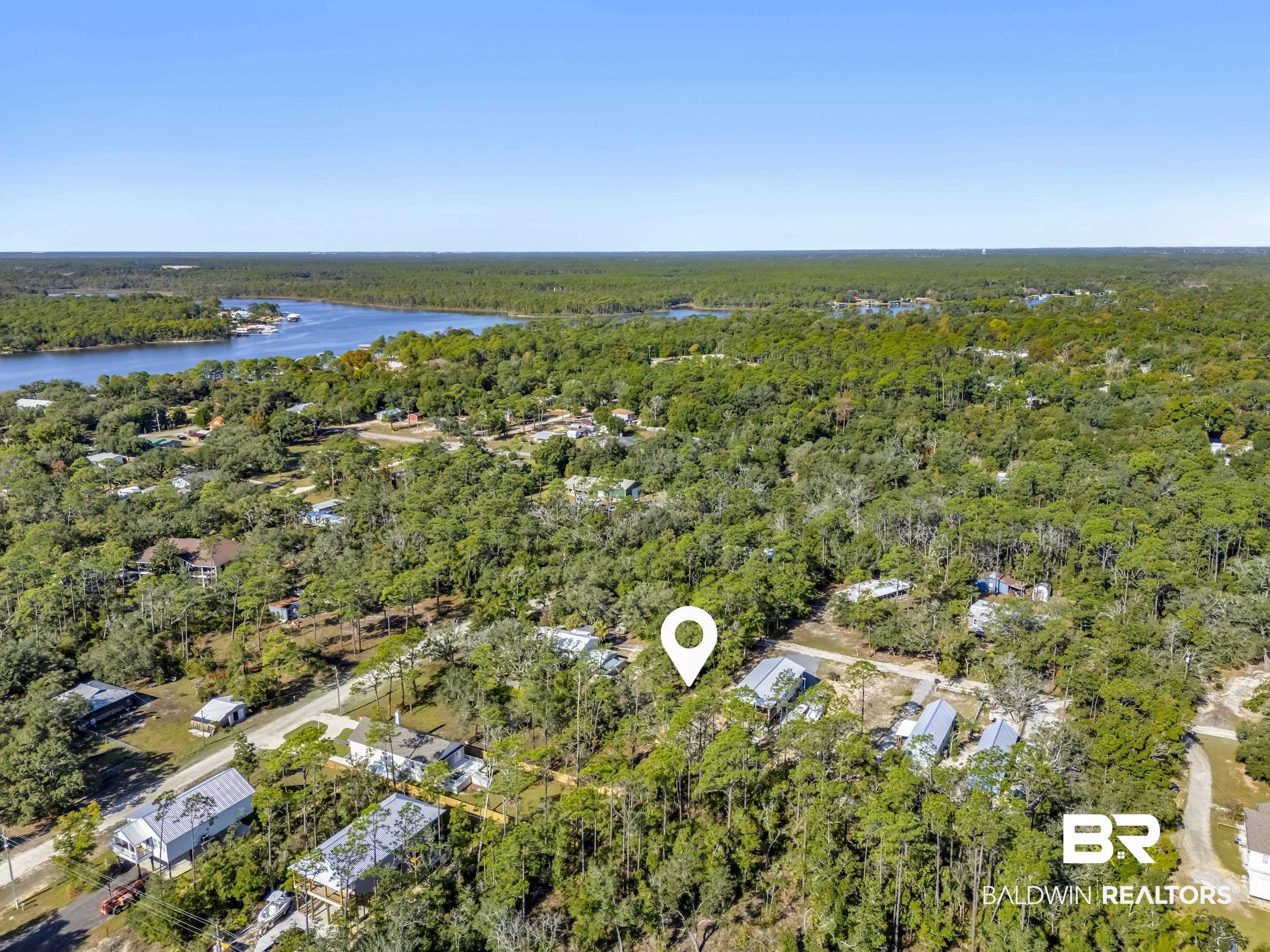 Pine Street Elberta, AL 36530 - Photo 13 of 13 Aerial overview of property's location with a forest and a large body of water