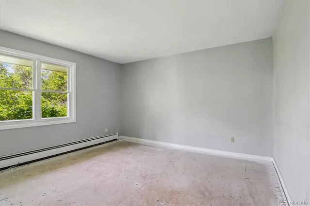 an empty room with windows
