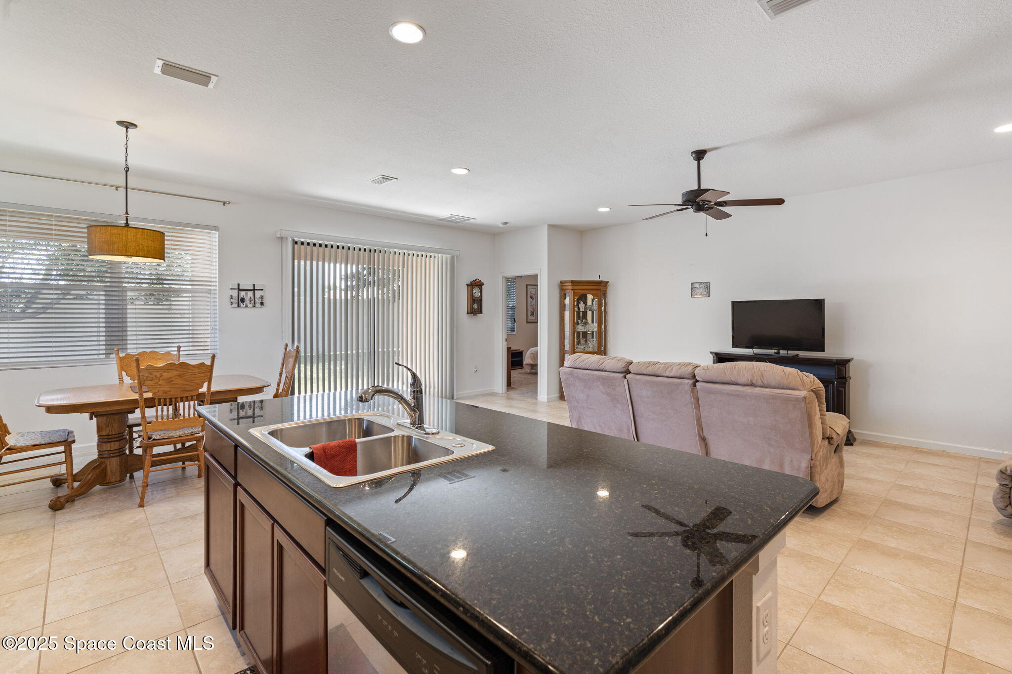 4015 Harvest Circle Rockledge, FL 32955 - Photo 11 of 40 a room with furniture pool table and windows