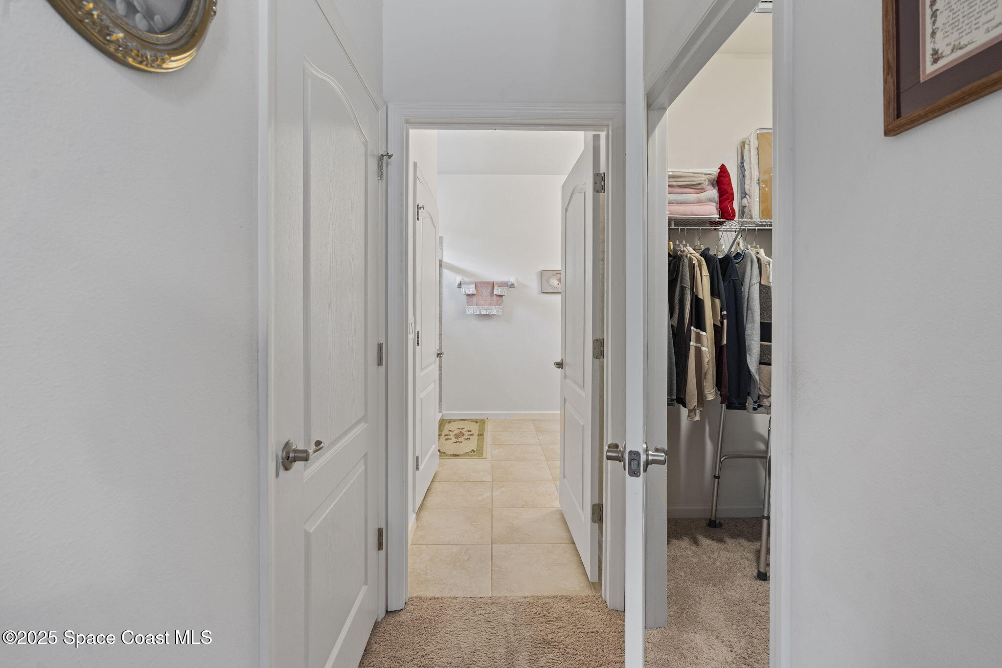 4015 Harvest Circle Rockledge, FL 32955 - Photo 30 of 40 a view of a hallway with closet and bathroom