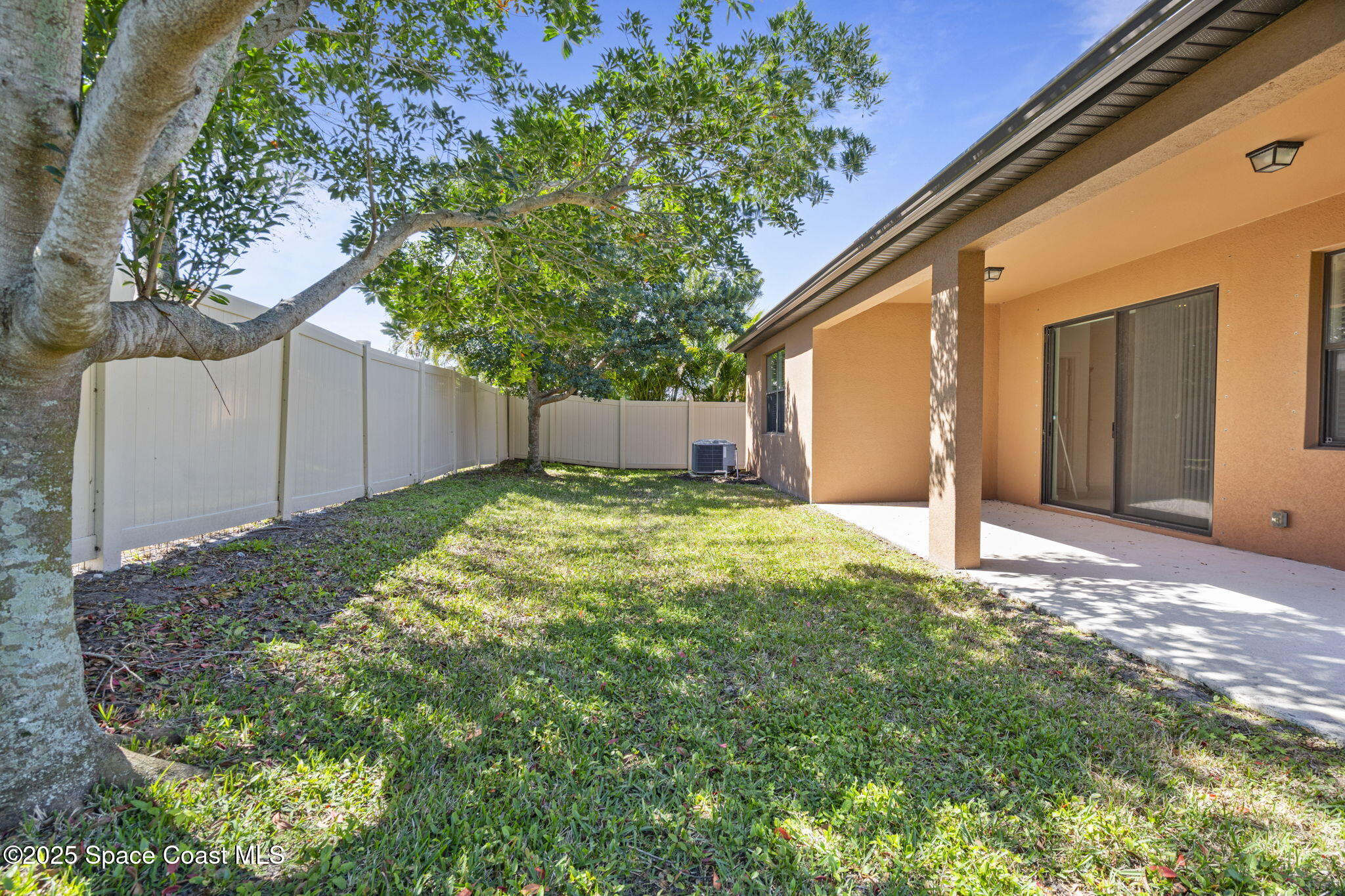 4015 Harvest Circle Rockledge, FL 32955 - Photo 39 of 40 a view of a house with a yard