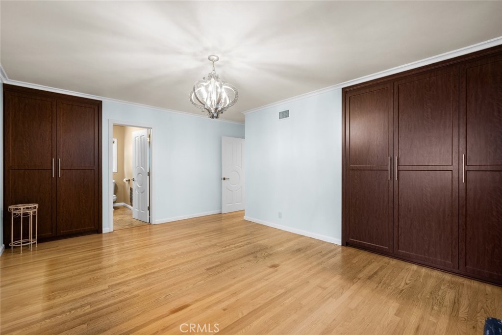 924 Crestview Drive Pasadena, CA 91107 - Photo 18 of 33 a view of an empty room with wooden floor