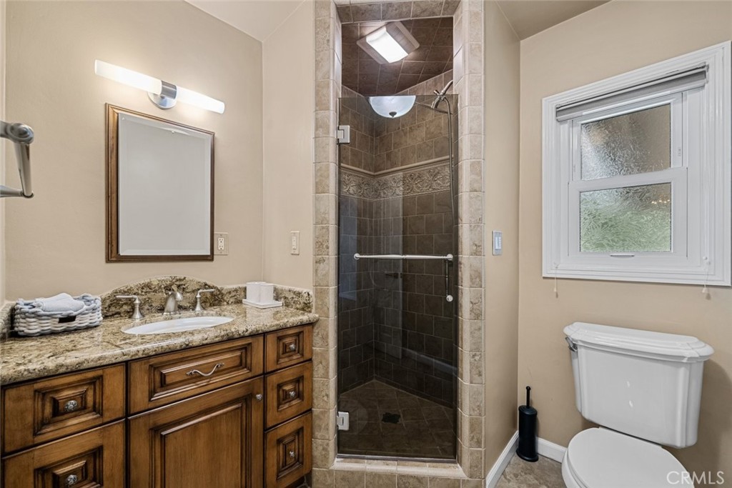 924 Crestview Drive Pasadena, CA 91107 - Photo 20 of 33 a bathroom with a sink a toilet and shower