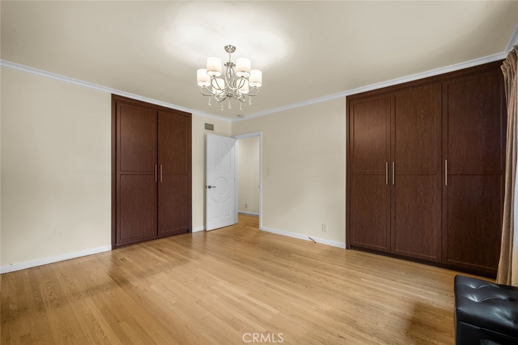 924 Crestview Drive Pasadena, CA 91107 - Photo 28 of 33 a view of an empty room with wooden floor