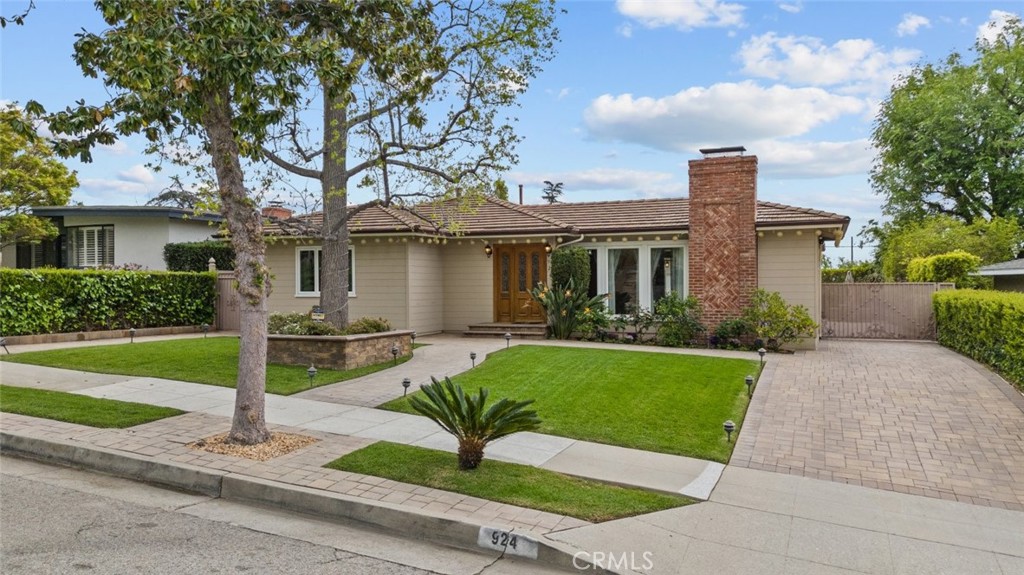 924 Crestview Drive Pasadena, CA 91107 - Photo 3 of 33 a house view with a garden and pathway