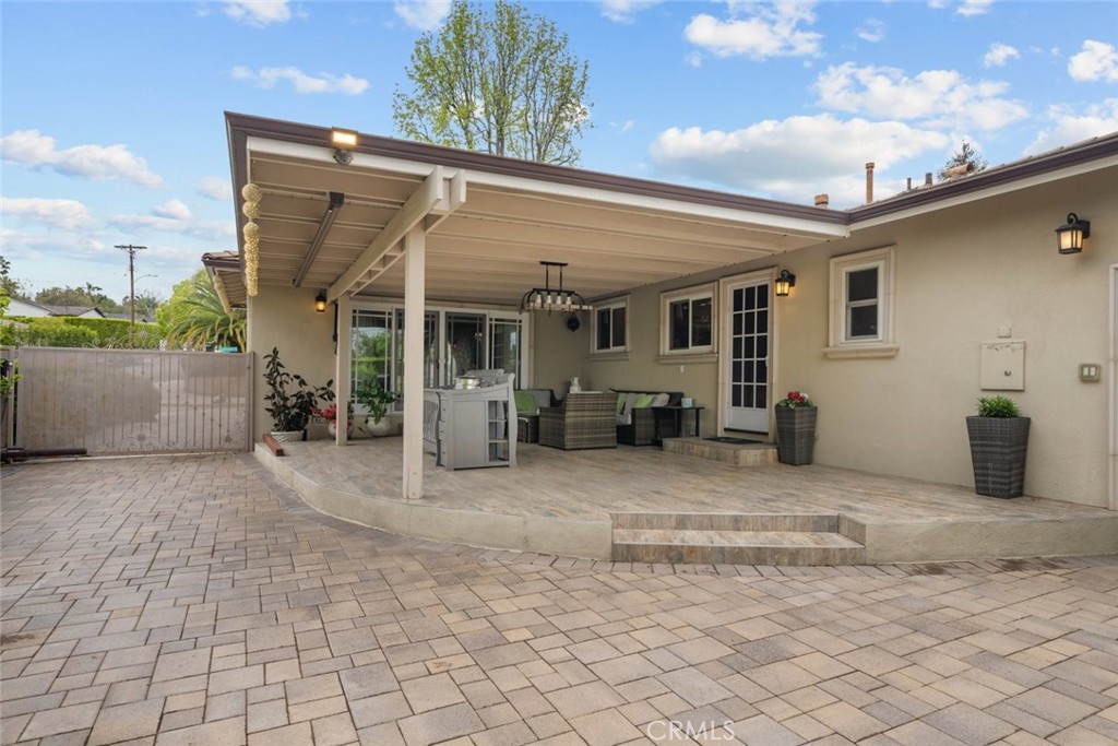 924 Crestview Drive Pasadena, CA 91107 - Photo 32 of 33 a view of a chair and tables in patio of the house