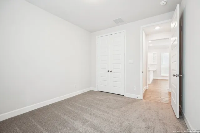 an empty room with a natural light