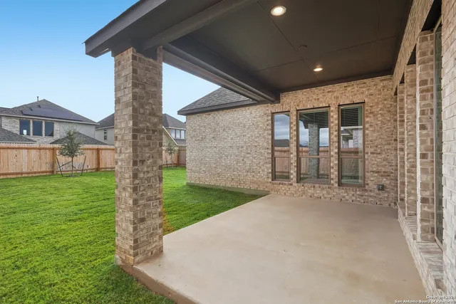 a view of a back yard of the house