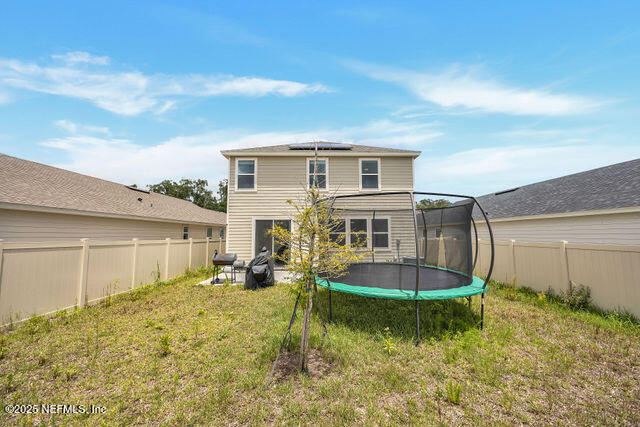 136 Peace River Road St. Johns, FL 32259 - Photo 14 of 52 a front view of a house with a yard