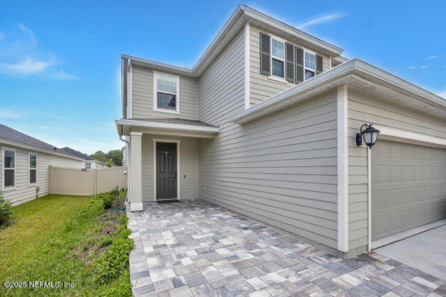 136 Peace River Road St. Johns, FL 32259 - Photo 3 of 52 a view of a house with a yard