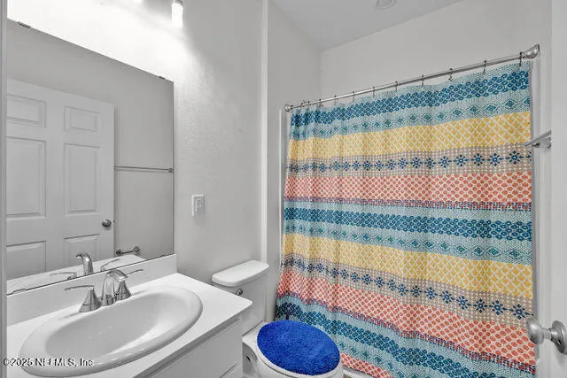 a view of a patio with a table and chairs