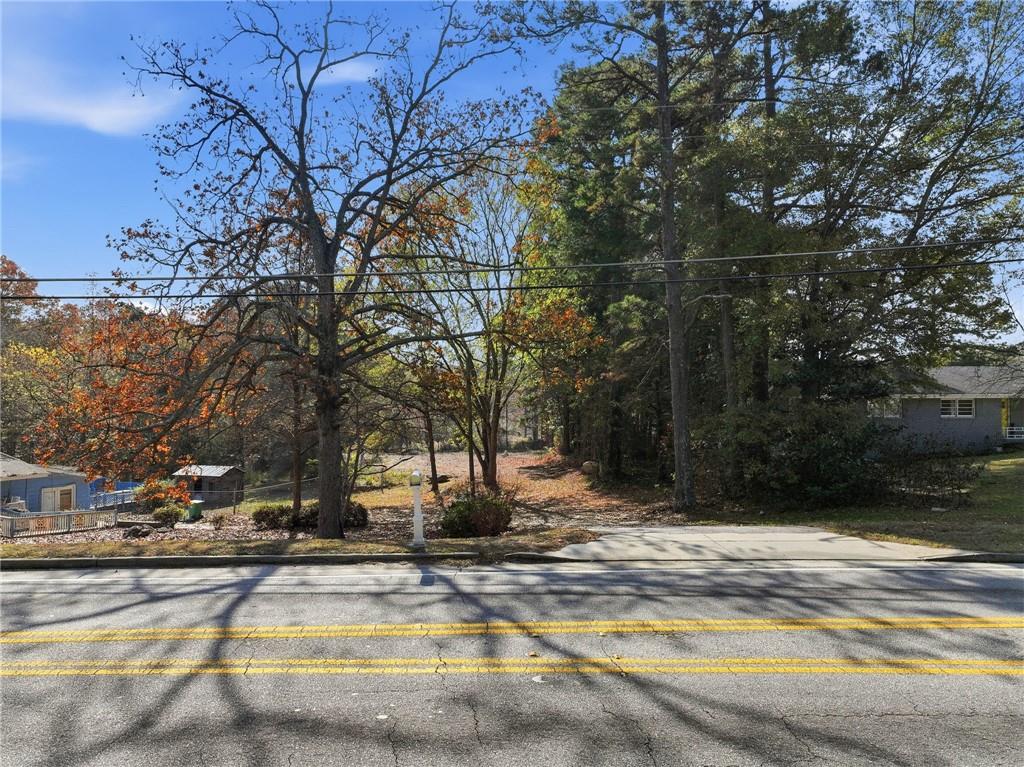 7411 Pleasant Hill Road Lithonia, GA 30058 - Photo 3 of 15 a view of a park with trees